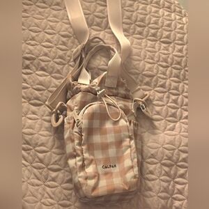 Calpak Peach & Cream Gingham Drawstring Mini Crossbody